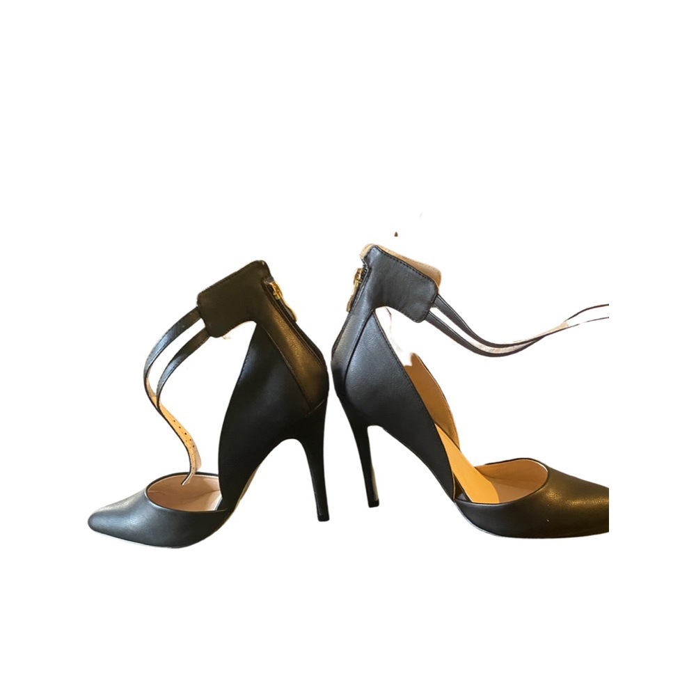 Black high heels with ankle straps